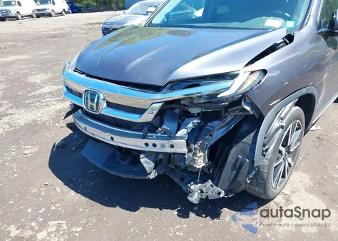 2021 Honda Pilot Awd Touring 8 Passenger from USA, damaged, VIN 5FNYF6H9XMB059037